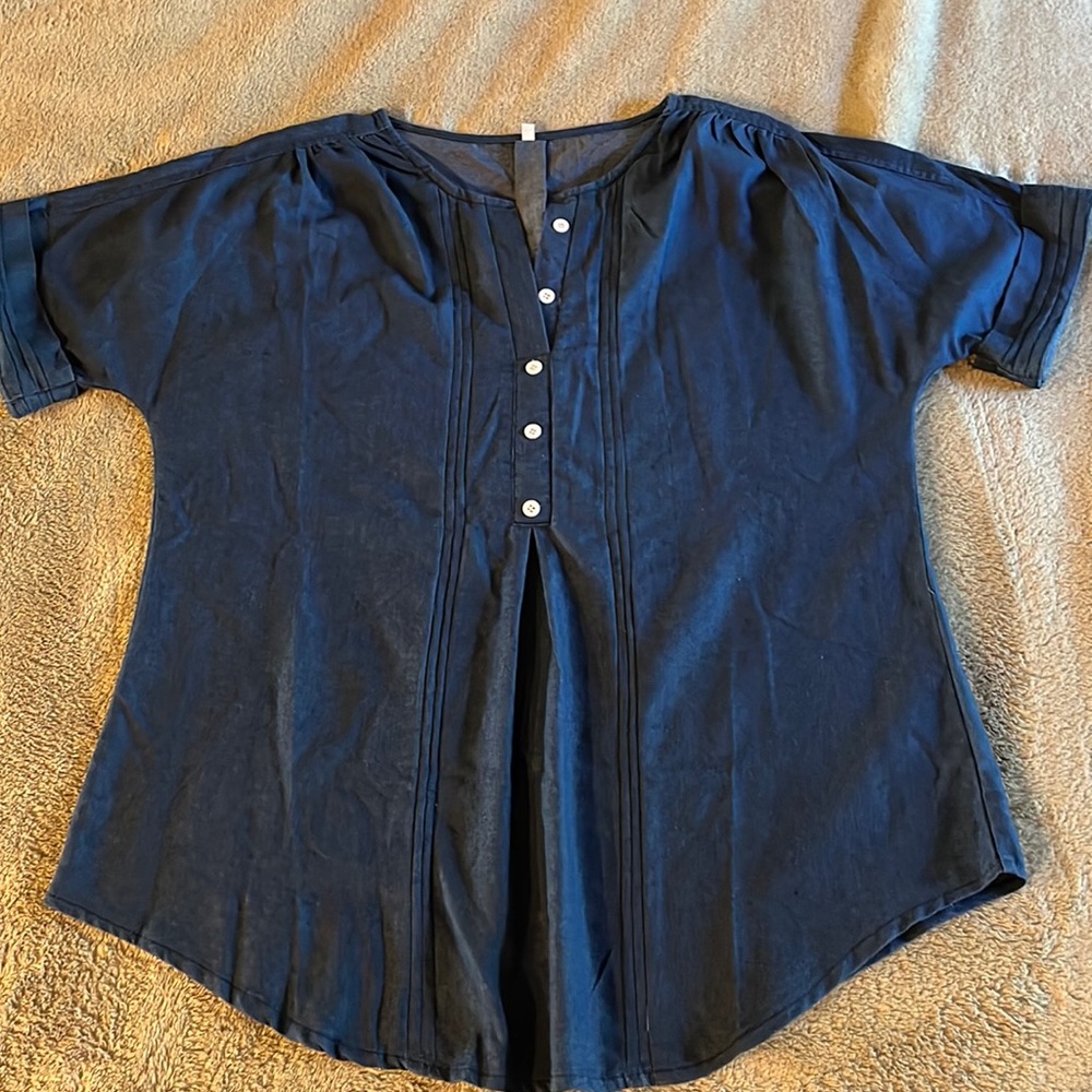 Super cute denim polyester chic blouse.